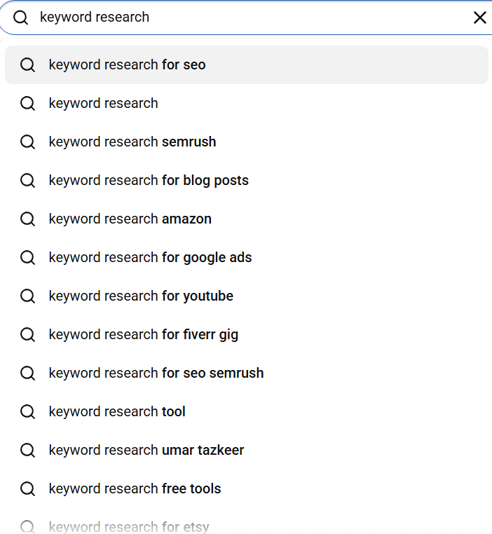 YouTube search bar showing autocomplete suggestions dropdown